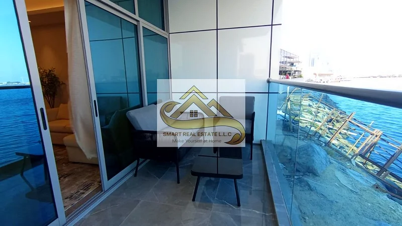a luxury two  bed room and a hall big size  for sale In the most luxurious towers of Ajman ajman creek towers withe theree  batherooms and a   kitchen63874898573569114