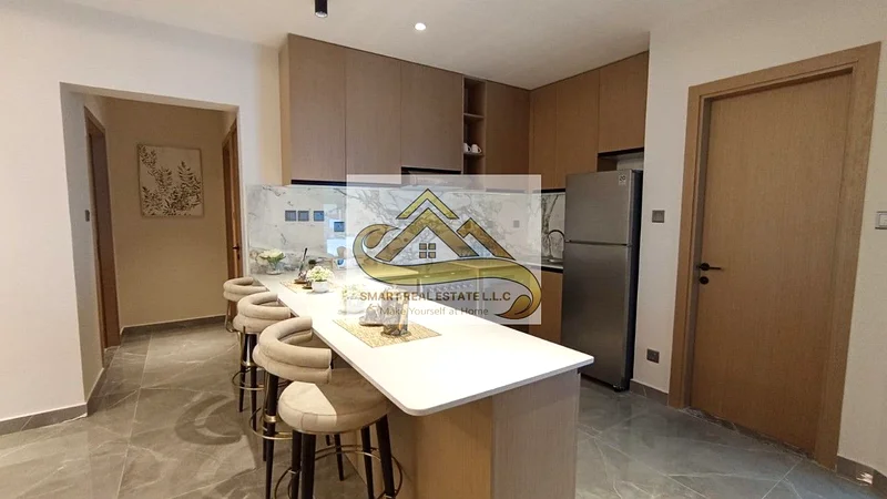 a luxury two  bed room and a hall big size  for sale In the most luxurious towers of Ajman ajman creek towers withe theree  batherooms and a   kitchen63874898573569113