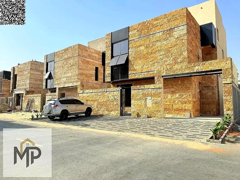 Villa for sale - two floors and a large courtyard - close to Sheikh Mohammed bin Zayed Road - freehold for all nationalities for life -63880510949507110