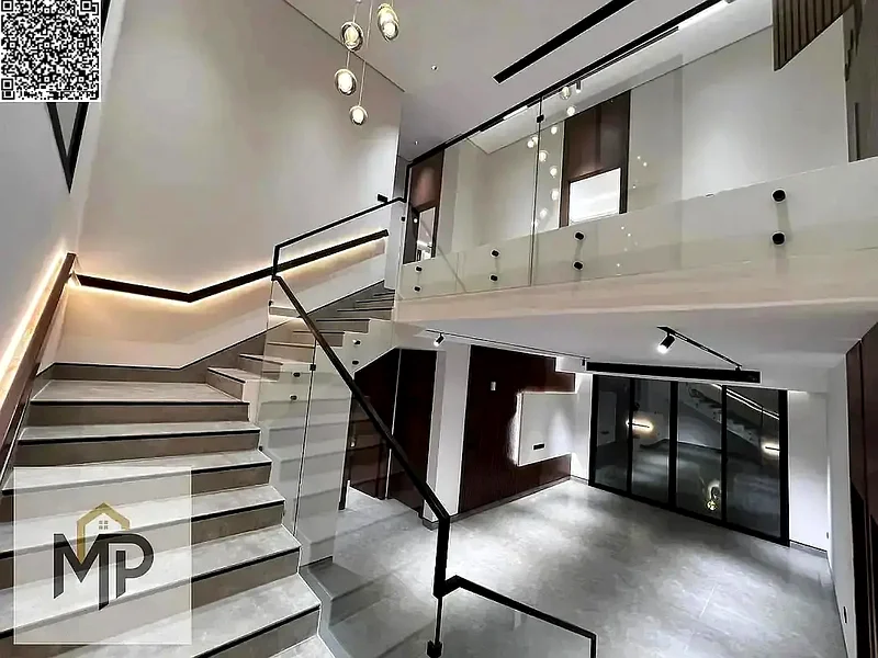 Villa for sale - two floors and a large courtyard - close to Sheikh Mohammed bin Zayed Road - freehold for all nationalities for life -63880510949507113