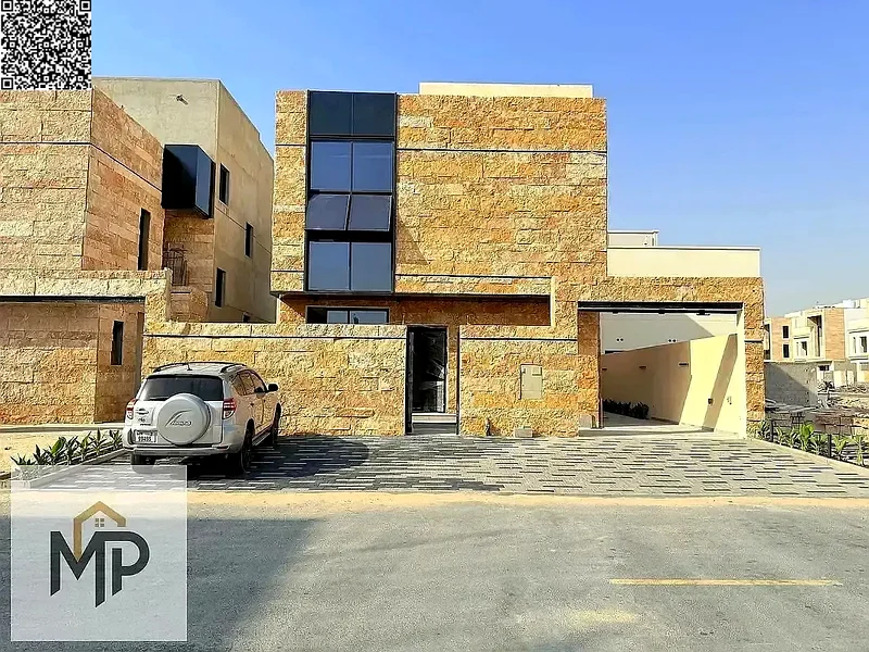 Villa for sale - two floors and a large courtyard - close to Sheikh Mohammed bin Zayed Road - freehold for all nationalities for life -63880510949507111