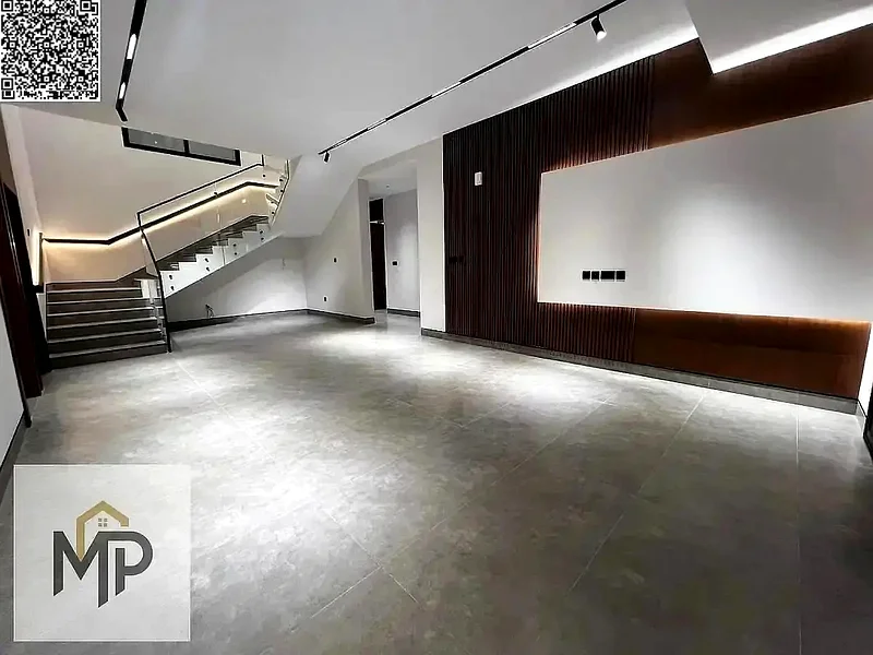 Villa for sale - two floors and a large courtyard - close to Sheikh Mohammed bin Zayed Road - freehold for all nationalities for life -63880510949507112