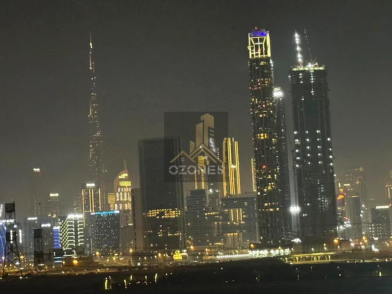 منظر برج خليفة والبحيرة، صفقة للمستثمر63975530880769110