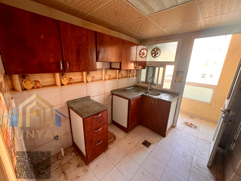 For Rent: Spacious 1-Bedroom Apartment in Ajman – Al Rawda 3, located directly on Amar Street in a prime and vibrant area, offering wide spaces and a63718756637954113
