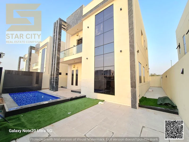 For sale - a luxury villa with a swimming pool in a prime location in Ajman, high-end finishing, modern design, including registration and owners63913993942786112