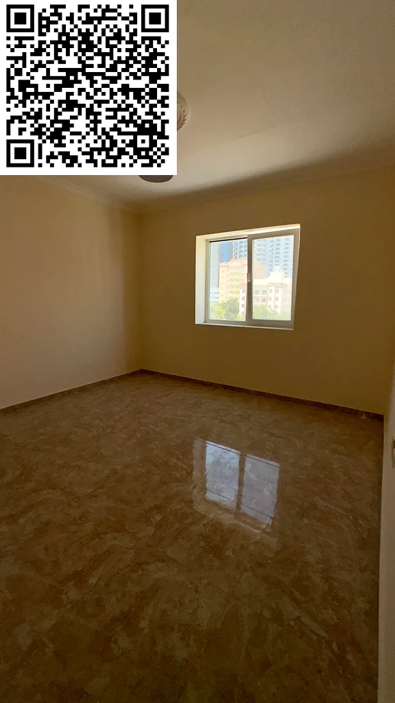 For annual rent, a luxurious apartment, second floor, in Al Rashidiya 2, Ajman, two bedrooms including a master bedroom, a spacious living room, a lar63721146068483111