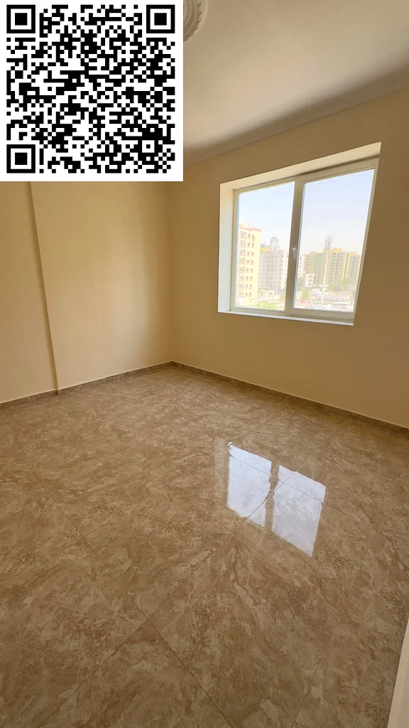 For annual rent, a luxurious apartment, second floor, in Al Rashidiya 2, Ajman, two bedrooms including a master bedroom, a spacious living room, a lar63721146068483112