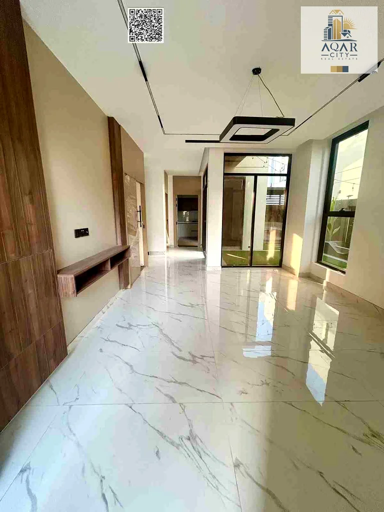 Hurry up and book your villa, ready with the key, including registration fees, freehold, in the most prestigious location in Al Helio, Ajman63904146334209111