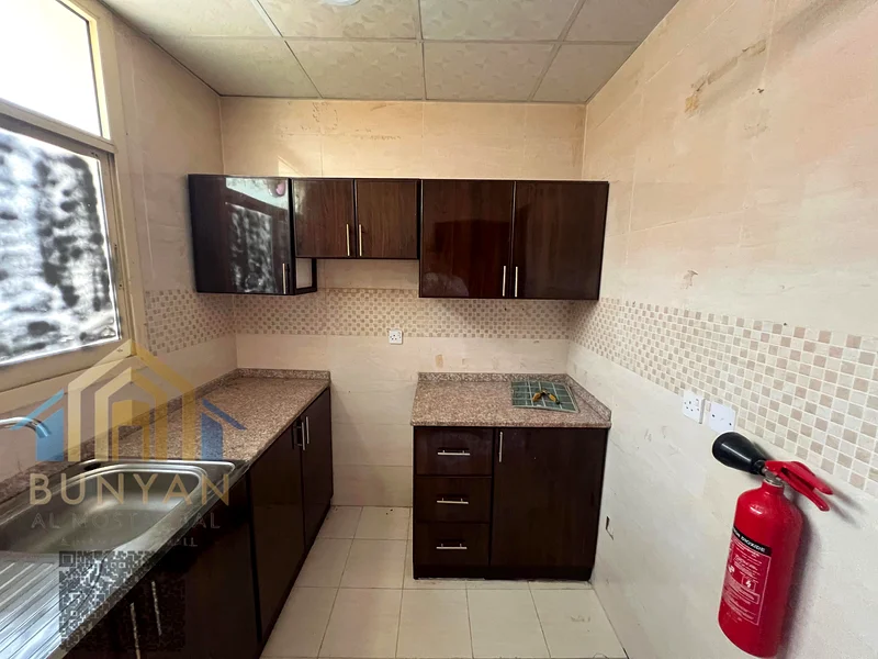 For Rent: Spacious 1-Bedroom Apartment in Ajman – Al Rawda 3, located directly on Amar Street, in a prime area close to schools, shopping malls, resta63718756648835114