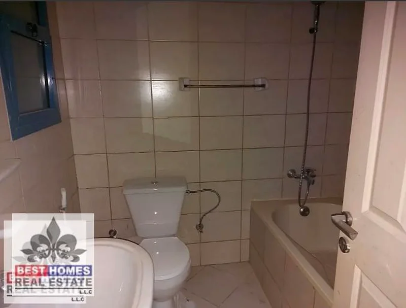 شقة من غرفتي نوم متوفرة للبيع في برج الرشيديه عجمان63889027134850113