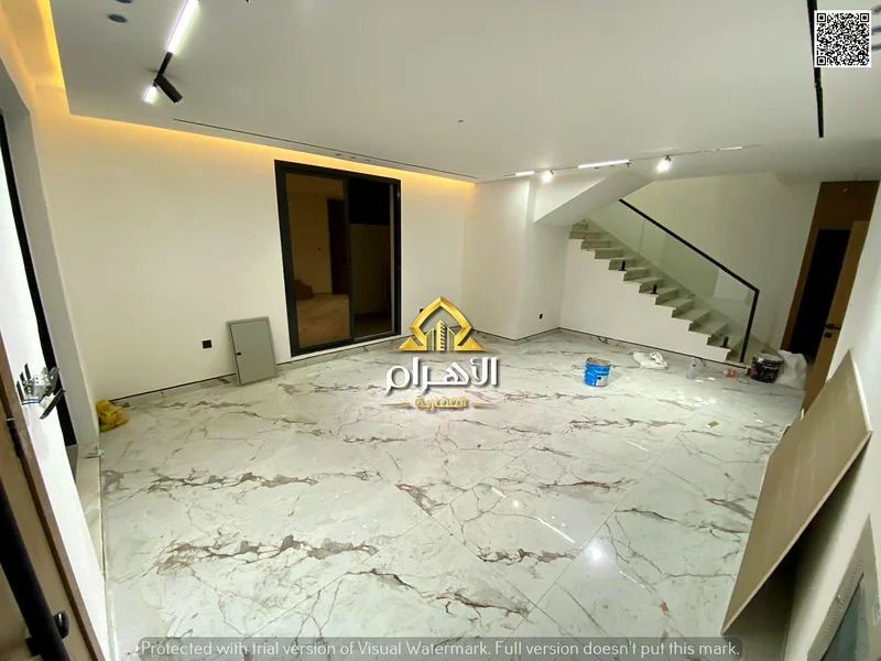 Without a down payment, own a luxurious villa for sale in Al Helio 2, Ajman. Freehold for all nationalities, including registration and ownership fees63903070706177112