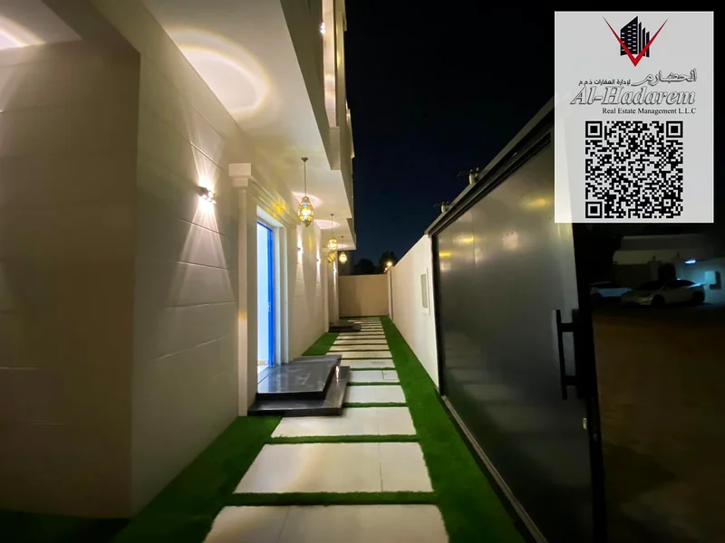 Andalusian style villa for sale in Ajman area, including registration, ownership, electricity and water fees63878505927043113