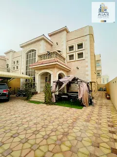 Villa for sale with electricity and water, stone facade opposite the mosque, five master rooms, 5,00
