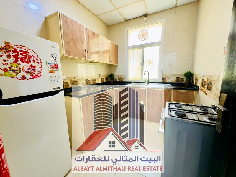 للإيجار – شقة واسعة من غرفتي نوم في عجمان، المويهات 263715769880065114