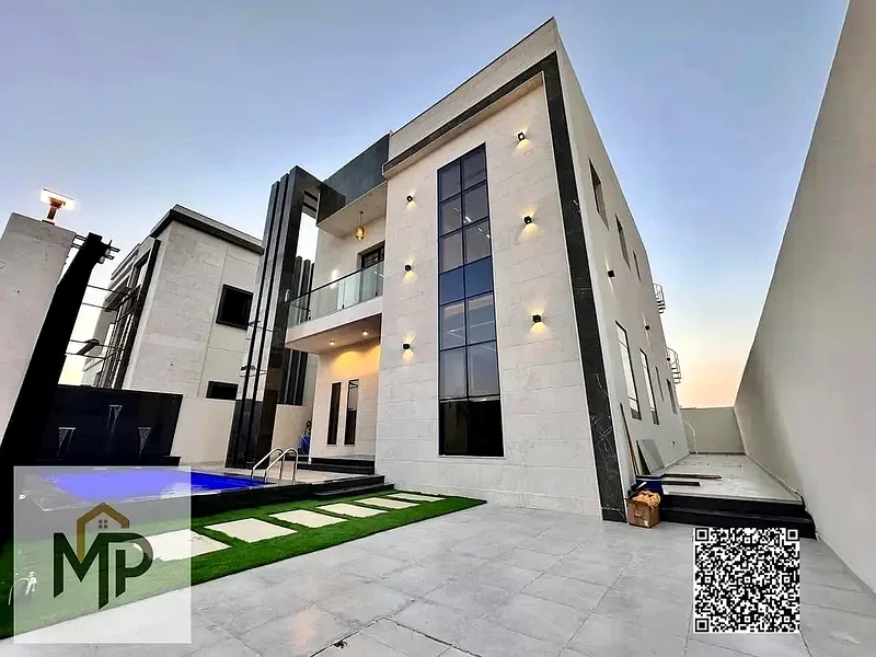 For sale - a luxury villa with a swimming pool in a prime location in Ajman, high-end finishing, modern design, including registration and owners63904952055682111
