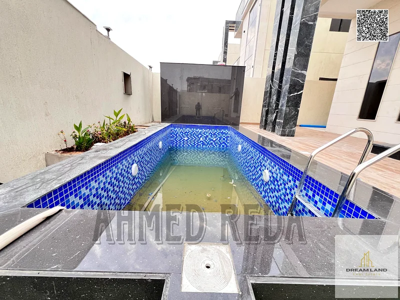 For sale - a luxury villa with a swimming pool in a prime location in Ajman, high-end finishing, modern design, including registration and swimming63904698204289112