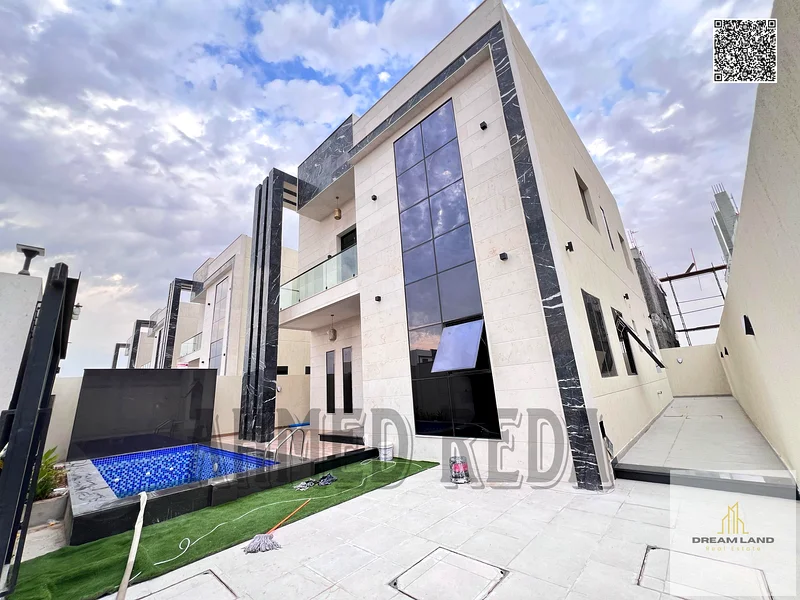 For sale - a luxury villa with a swimming pool in a prime location in Ajman, high-end finishing, modern design, including registration and swimming63904698204289111