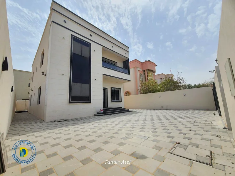 For those with luxury, a 5-room villa with spacious areas, including water, electricity and AC, in Al Muwaihat 1,bank financing, freehold63868632213250111