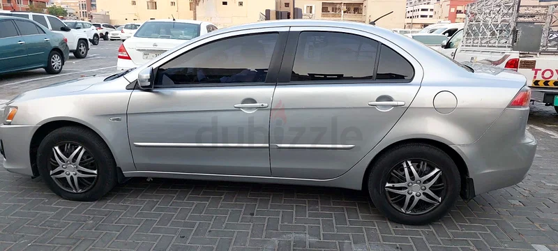 ميتسوبيشي لانسر 2016 | أوتوماتيك بالكامل | V4 | مواصفات خليجية | خالي من المشاكل | بحالة جيدة للبيع63612068119937113