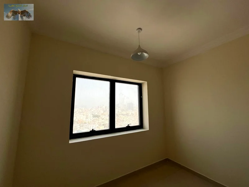 شقة مكونة من غرفتي نوم للإيجار في النعيمية 1 – عجمان63724125558915114