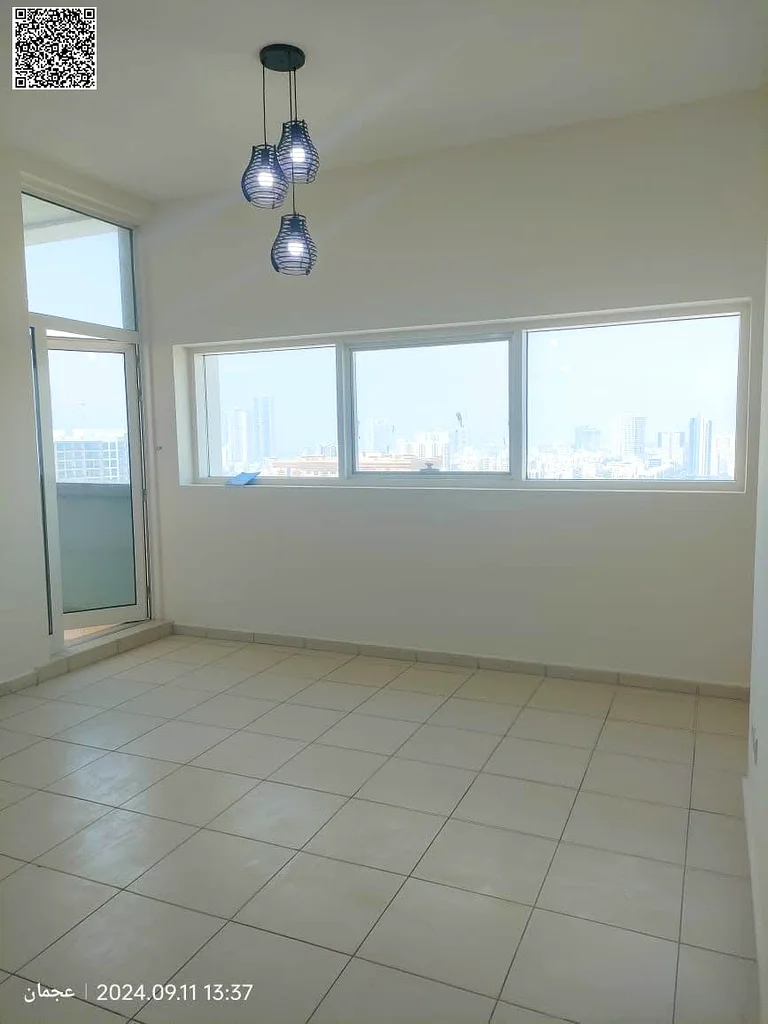 Own a 2BR + living room apartment in Ajman Towers with gym, pool & garden for just AED 100K down payment | modern, comfortable finishes & design63866845271299111