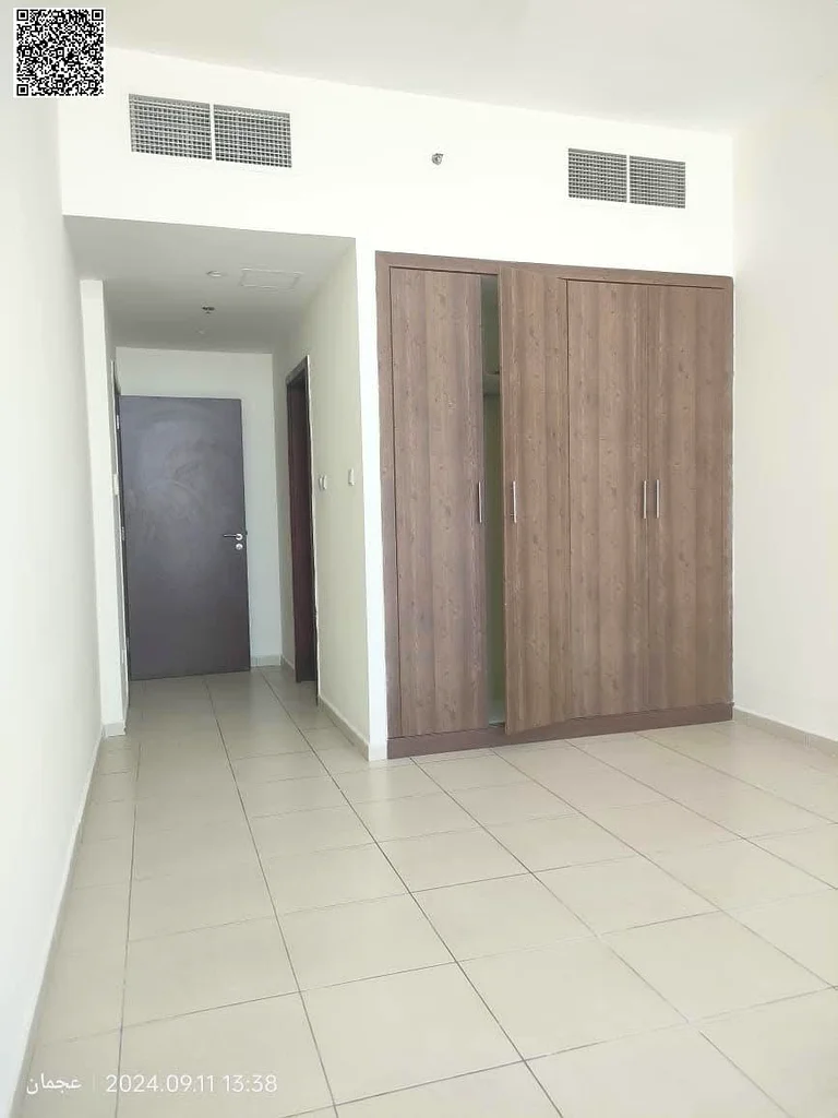 Own a 2BR + living room apartment in Ajman Towers with gym, pool & garden for just AED 100K down payment | modern, comfortable finishes & design63866845271299114