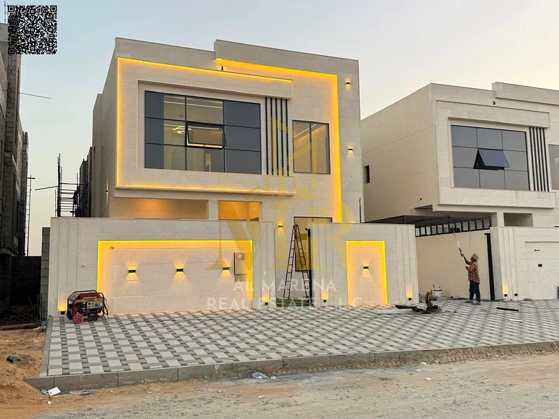 A villa with a price including registration and ownership fees on the main street, ready for occupancy in the most upscale areas of Ajman, freehold fo63904245670914110