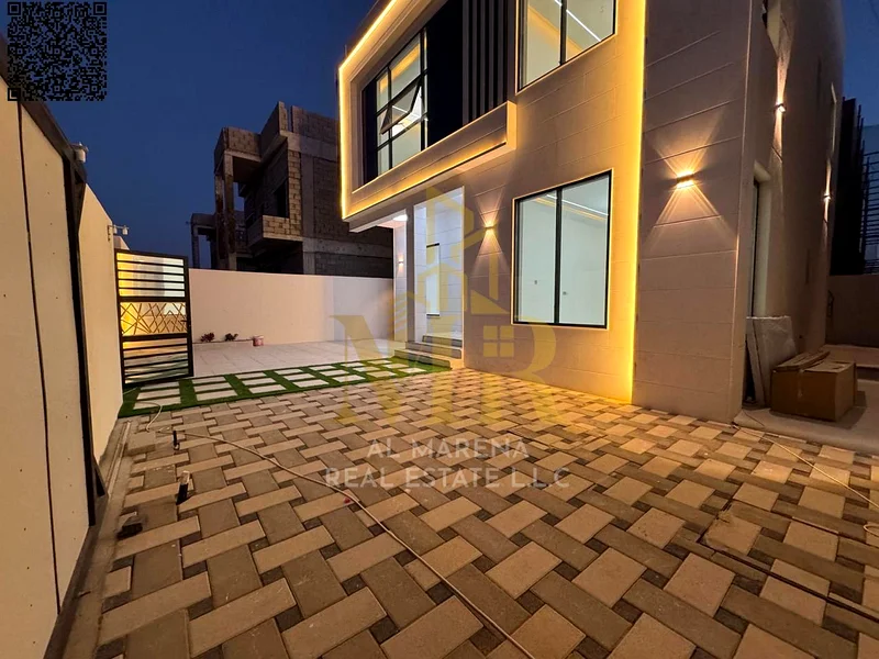 A villa with a price including registration and ownership fees on the main street, ready for occupancy in the most upscale areas of Ajman, freehold fo63904245670914114