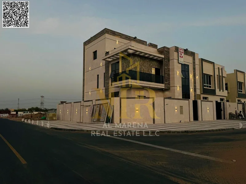 A villa with a price including registration and ownership fees on the main street, ready for occupancy in the most upscale areas of Ajman, freehold fo63904697950209110