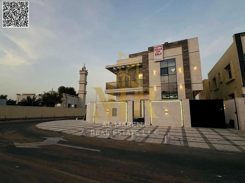 A villa with a price including registration and ownership fees on the main street, ready for occupancy in the most upscale areas of Ajman, freehold fo63904697950209114