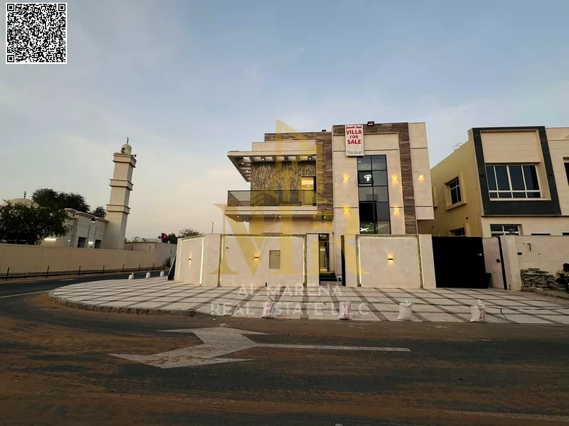 A villa with a price including registration and ownership fees on the main street, ready for occupancy in the most upscale areas of Ajman, freehold fo63904697950209113