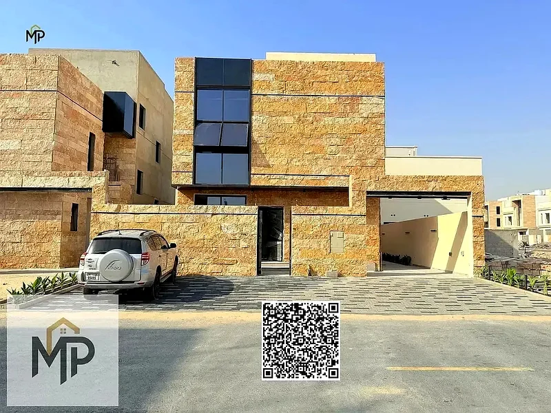 Villa for sale - two floors and a large courtyard - close to Sheikh Mohammed bin Zayed Road - freehold for all nationalities for life63882550816385112