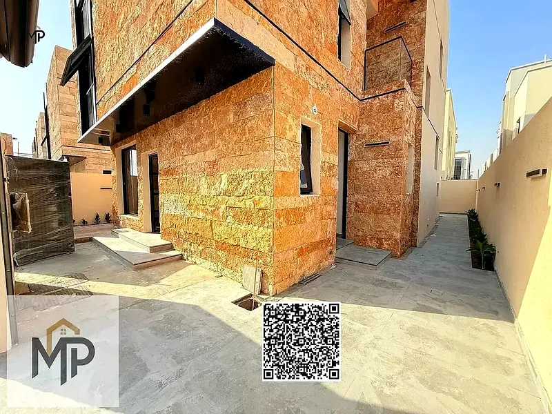 Villa for sale - two floors and a large courtyard - close to Sheikh Mohammed bin Zayed Road - freehold for all nationalities for life63882550816385113