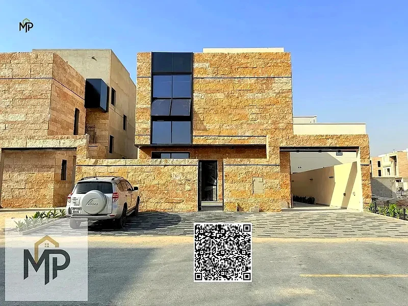 Villa for sale - two floors and a large courtyard - close to Sheikh Mohammed bin Zayed Road - freehold for all nationalities for life63882550816385111