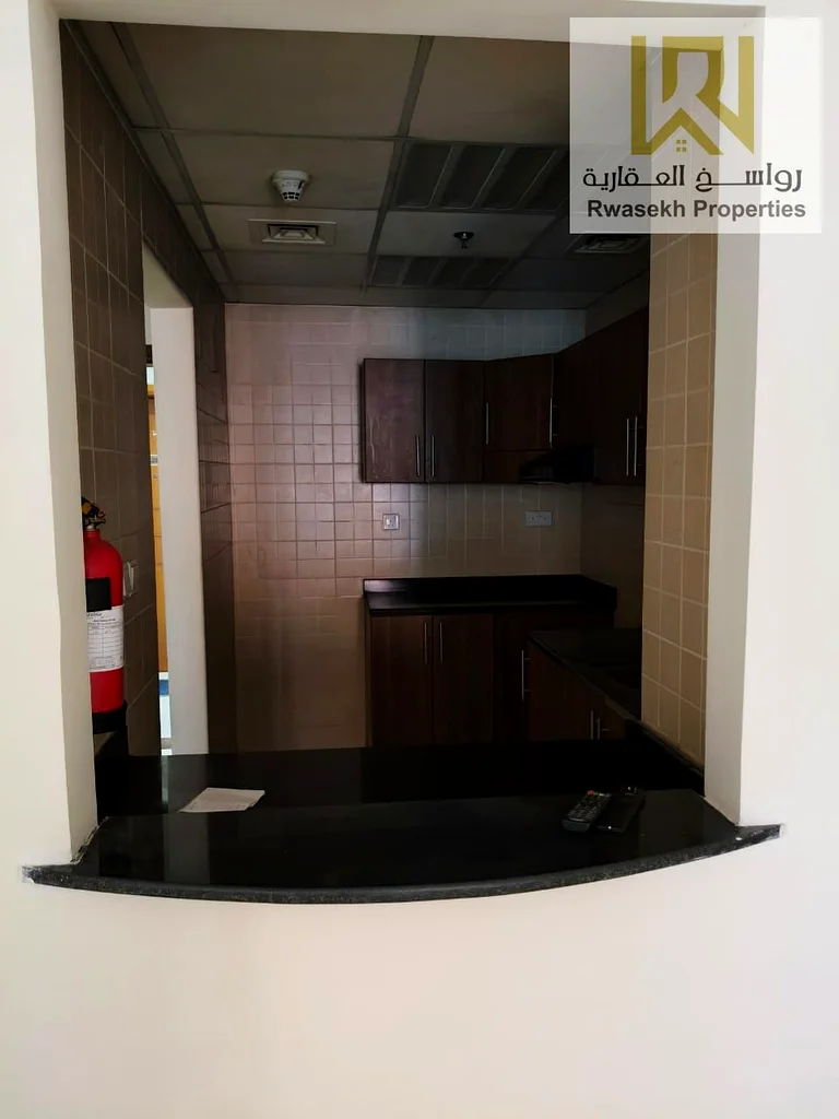 🏡 حياة حضرية أنيقة مع هدوء الحديقة وسحر المطبخ المفتوح للبيع: شقة أنيقة بغرفة نوم واحدة في أبراج عجمان وان – 975.1 قدم مربع ادخل إلى63866307226626113