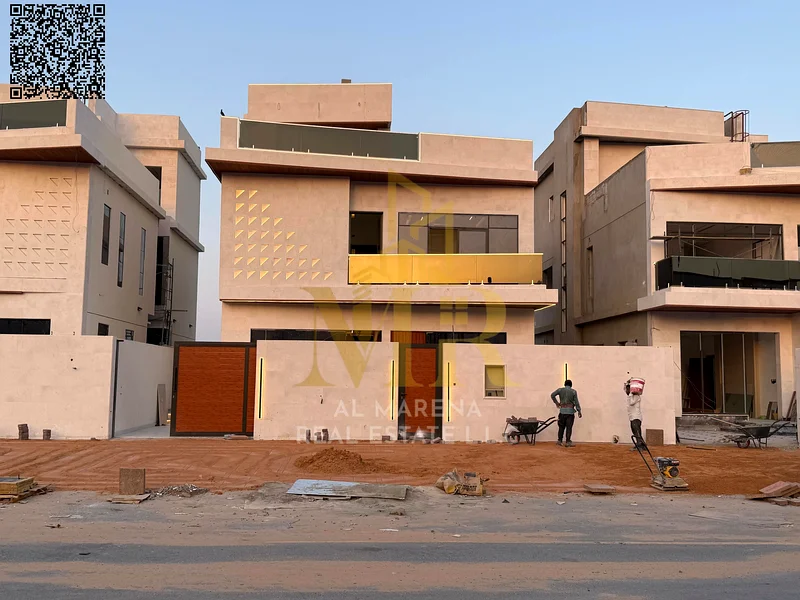 A villa with a price including registration and ownership fees on the main street, ready for occupancy in the most upscale areas of Ajman. Freehold fo63904245587587110