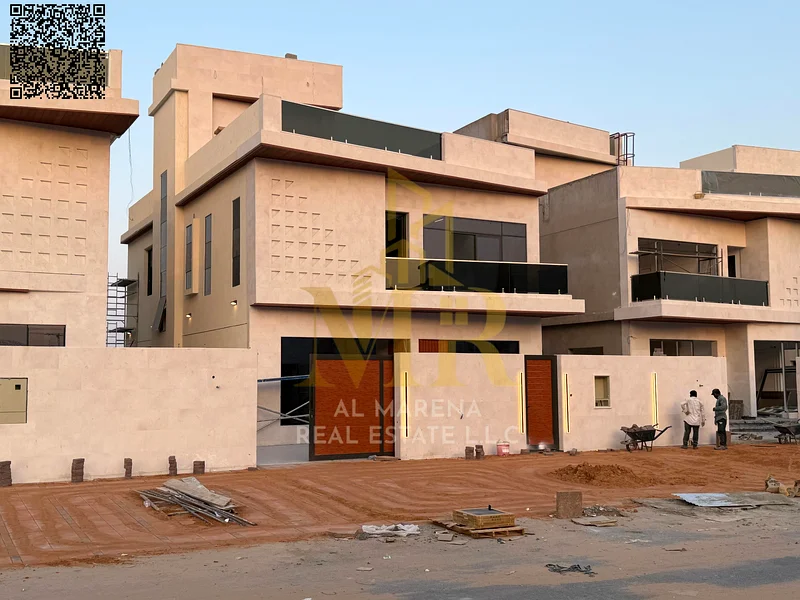 A villa with a price including registration and ownership fees on the main street, ready for occupancy in the most upscale areas of Ajman. Freehold fo63904245587587111