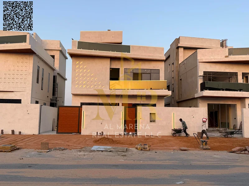 A villa with a price including registration and ownership fees on the main street, ready for occupancy in the most upscale areas of Ajman. Freehold fo63904245587587112