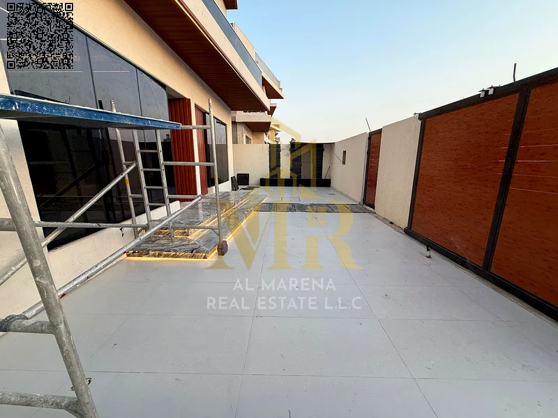A villa with a price including registration and ownership fees on the main street, ready for occupancy in the most upscale areas of Ajman. Freehold fo63904245587587114