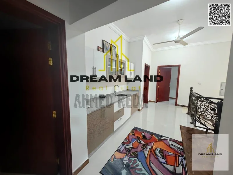 For sale - Villa in Al Rawda 2 - Ajman | Two floors | 5 master bedrooms | Majlis and hall | Spacious yard | On main street | Close to services | Freeh63878711528706111
