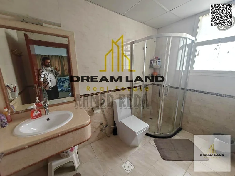 For sale - Villa in Al Rawda 2 - Ajman | Two floors | 5 master bedrooms | Majlis and hall | Spacious yard | On main street | Close to services | Freeh63878711528706112