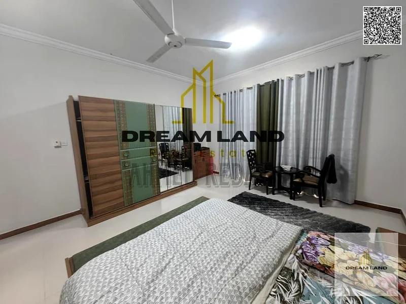 For sale - Villa in Al Rawda 2 - Ajman | Two floors | 5 master bedrooms | Majlis and hall | Spacious yard | On main street | Close to services | Freeh63878711528706114
