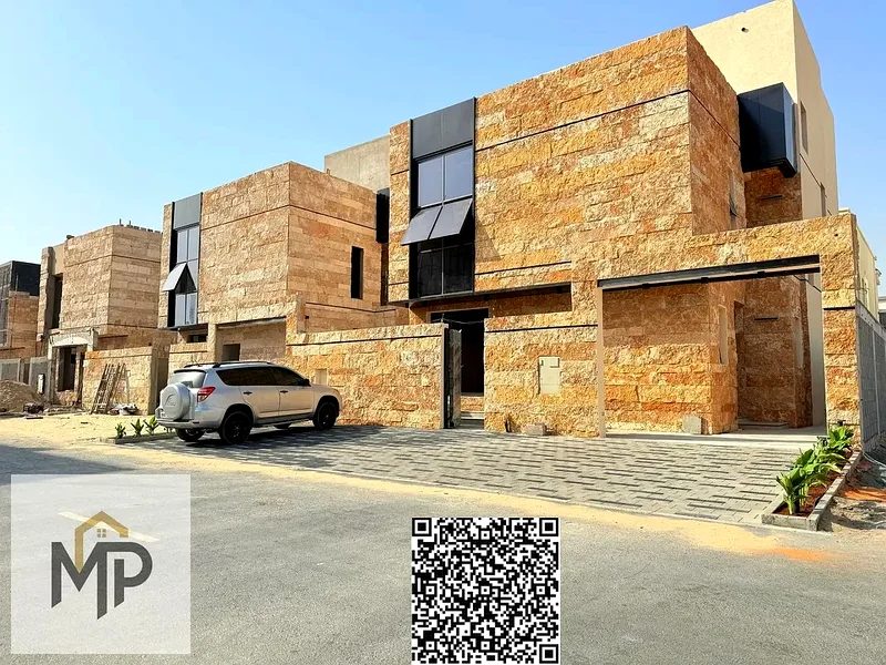 Villa for sale - two floors and a large courtyard - close to Sheikh Mohammed bin Zayed Road - freehold for all nationalities for life -63882550783873112