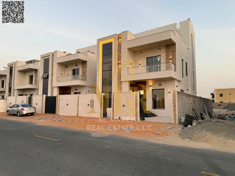 A villa with a price including registration and ownership fees on the main street, ready for occupancy in the most upscale areas of Ajman, freehold fo63882550795522111