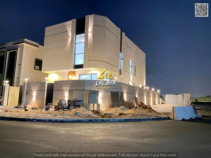 For sale, a corner villa in Al Helio 2 - Ajman, directly from the owner, in a prime location and excellent space. Registration fees included.63905344440066113