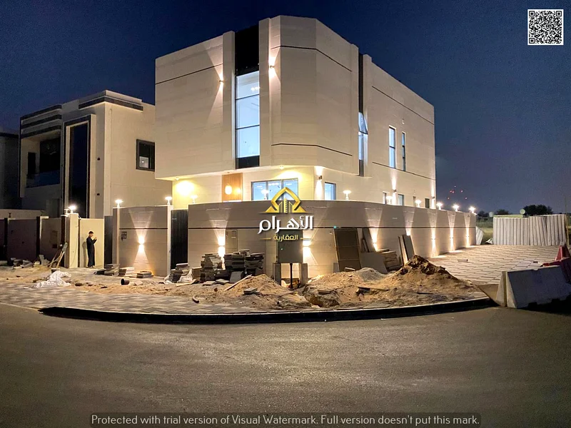 For sale, a corner villa in Al Helio 2 - Ajman, directly from the owner, in a prime location and excellent space. Registration fees included.63905344440066110