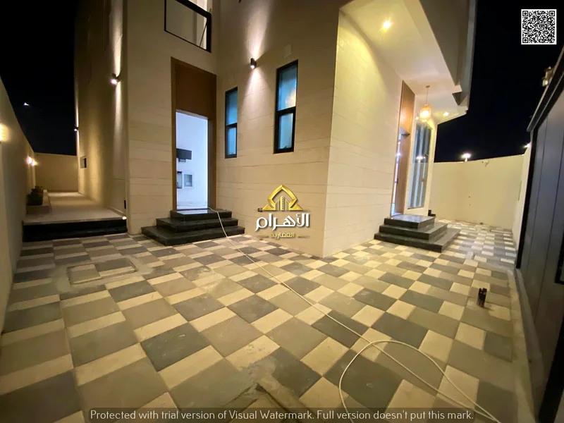 For sale, a corner villa in Al Helio 2 - Ajman, directly from the owner, in a prime location and excellent space. Registration fees included.63905344440066114