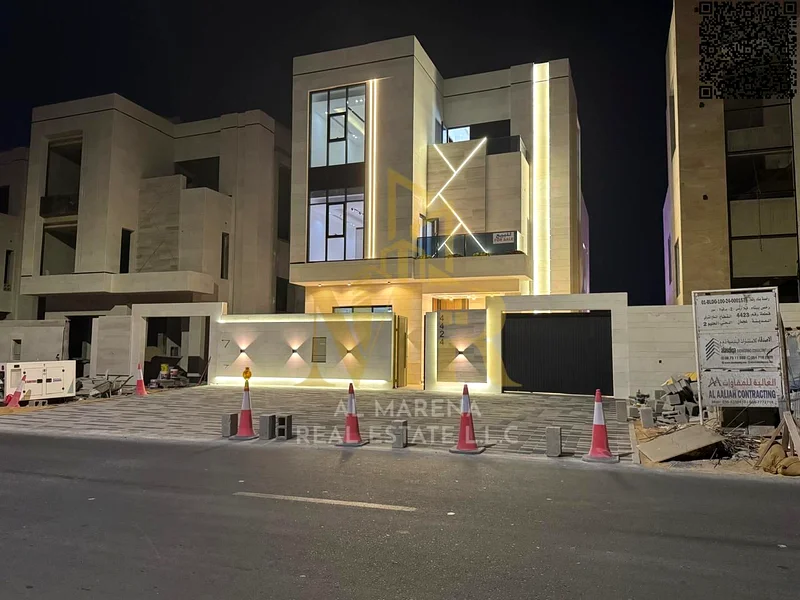 A villa with a price including registration and ownership fees on the main street, ready for occupancy in the most upscale areas of Ajman, freehold fo63905218403843112