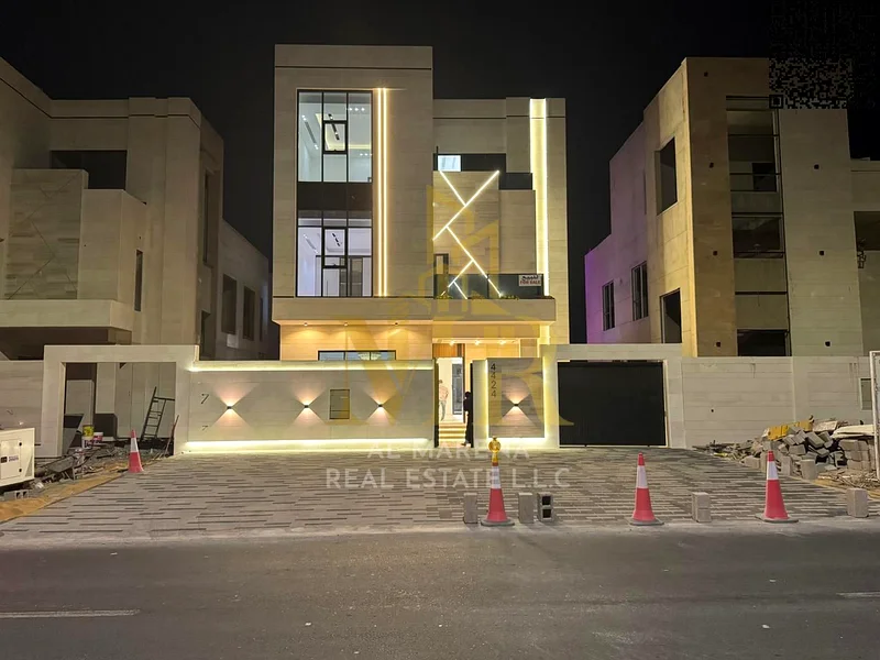 A villa with a price including registration and ownership fees on the main street, ready for occupancy in the most upscale areas of Ajman, freehold fo63905218403843111