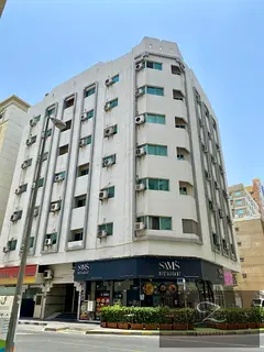For sale: Residential and commercial corner building in Sharjah / Al Qasimia
